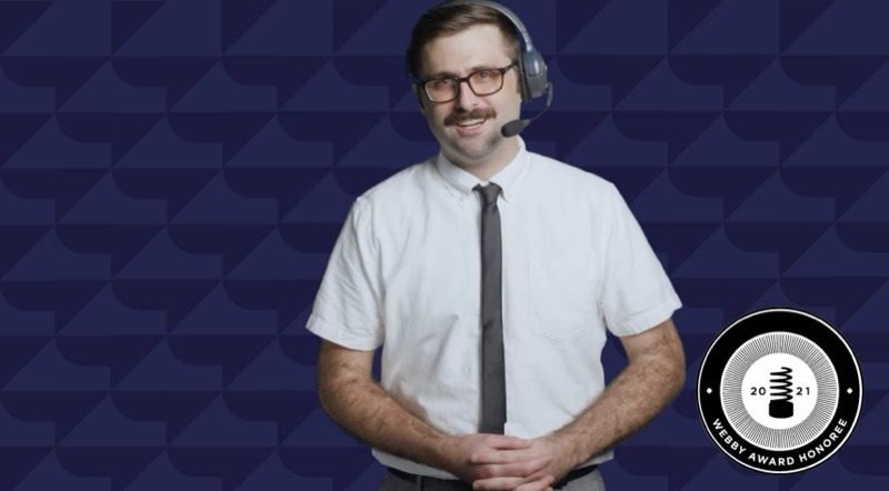 Scott Rowan in a headset and tie, hosting HostGator’s Hosted series